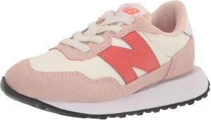 New Balance Kids 237 Bungee Sneaker, OYSTER PINK/MARS RED, 2 W Infant (0-12 Months)