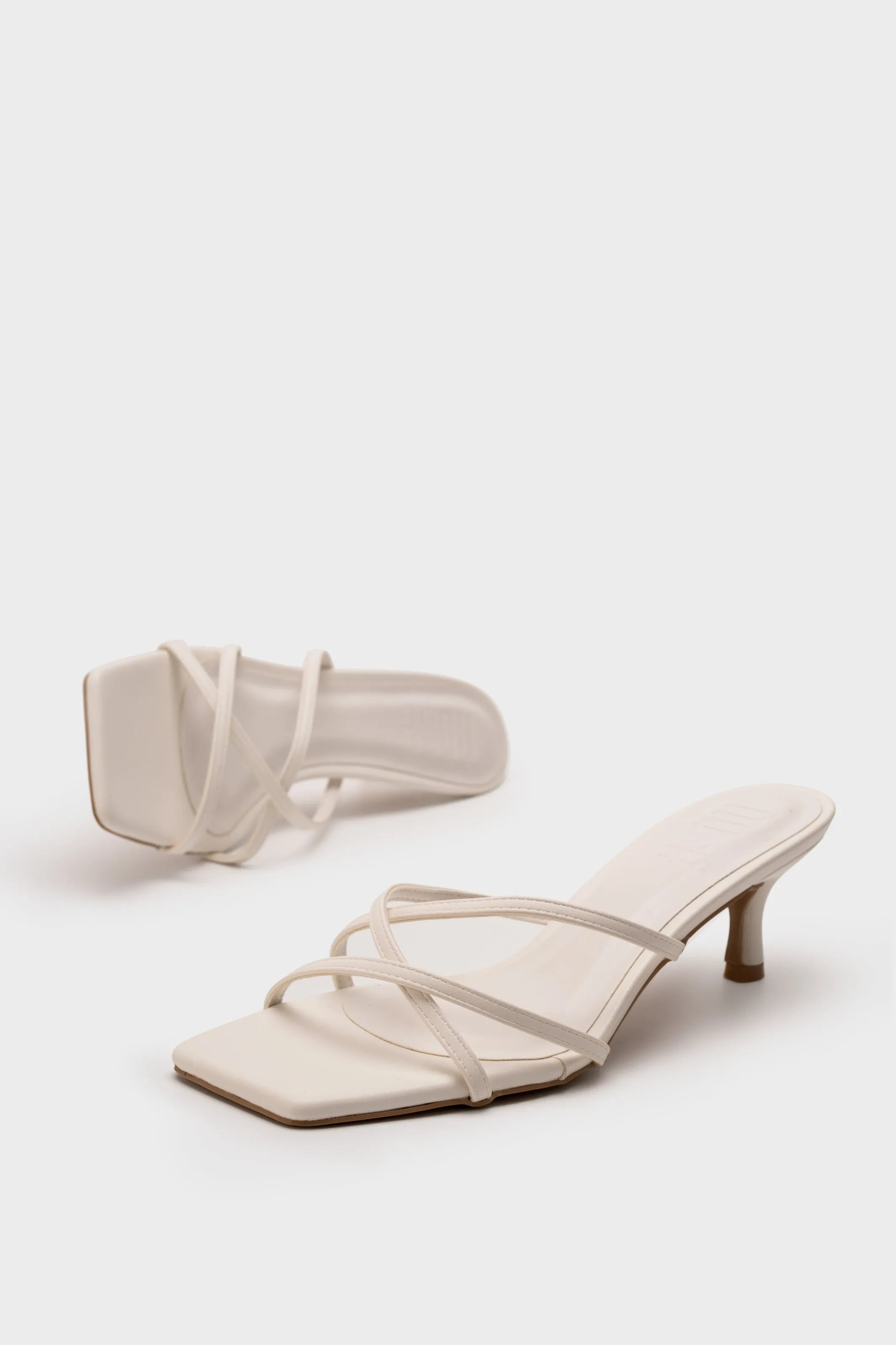STRAPPY HEEL SLIDE