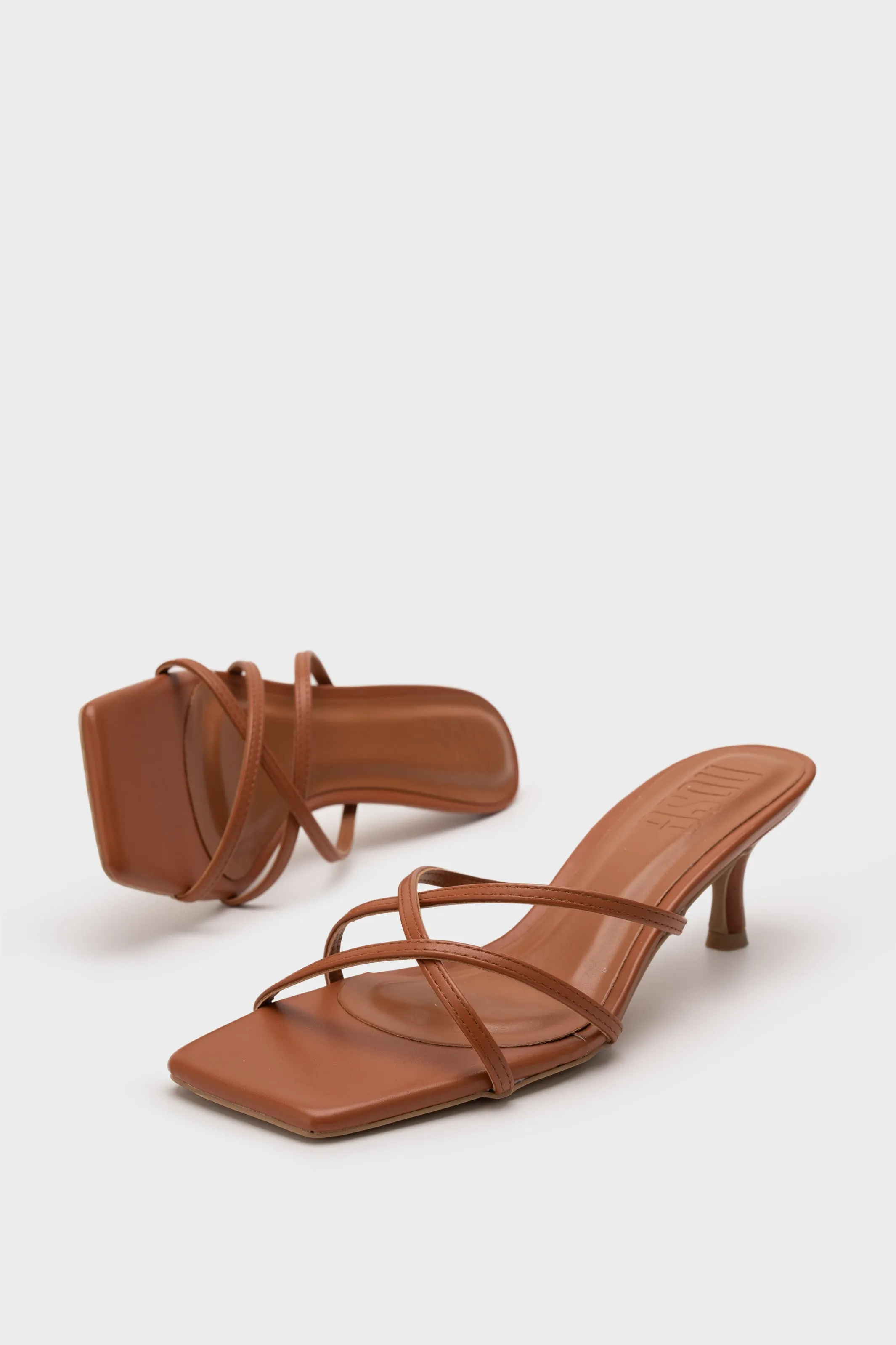 STRAPPY HEEL SLIDE