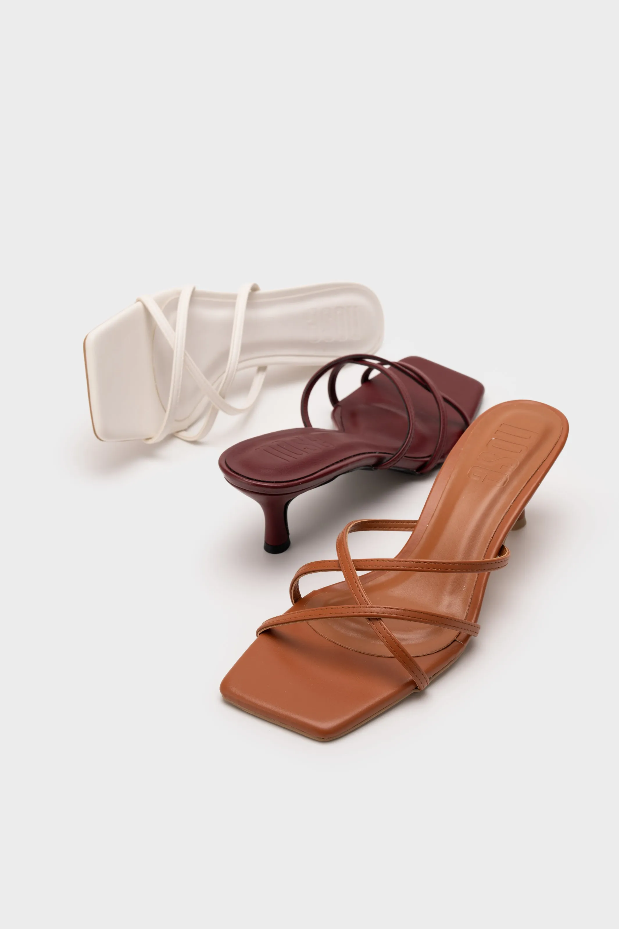 STRAPPY HEEL SLIDE