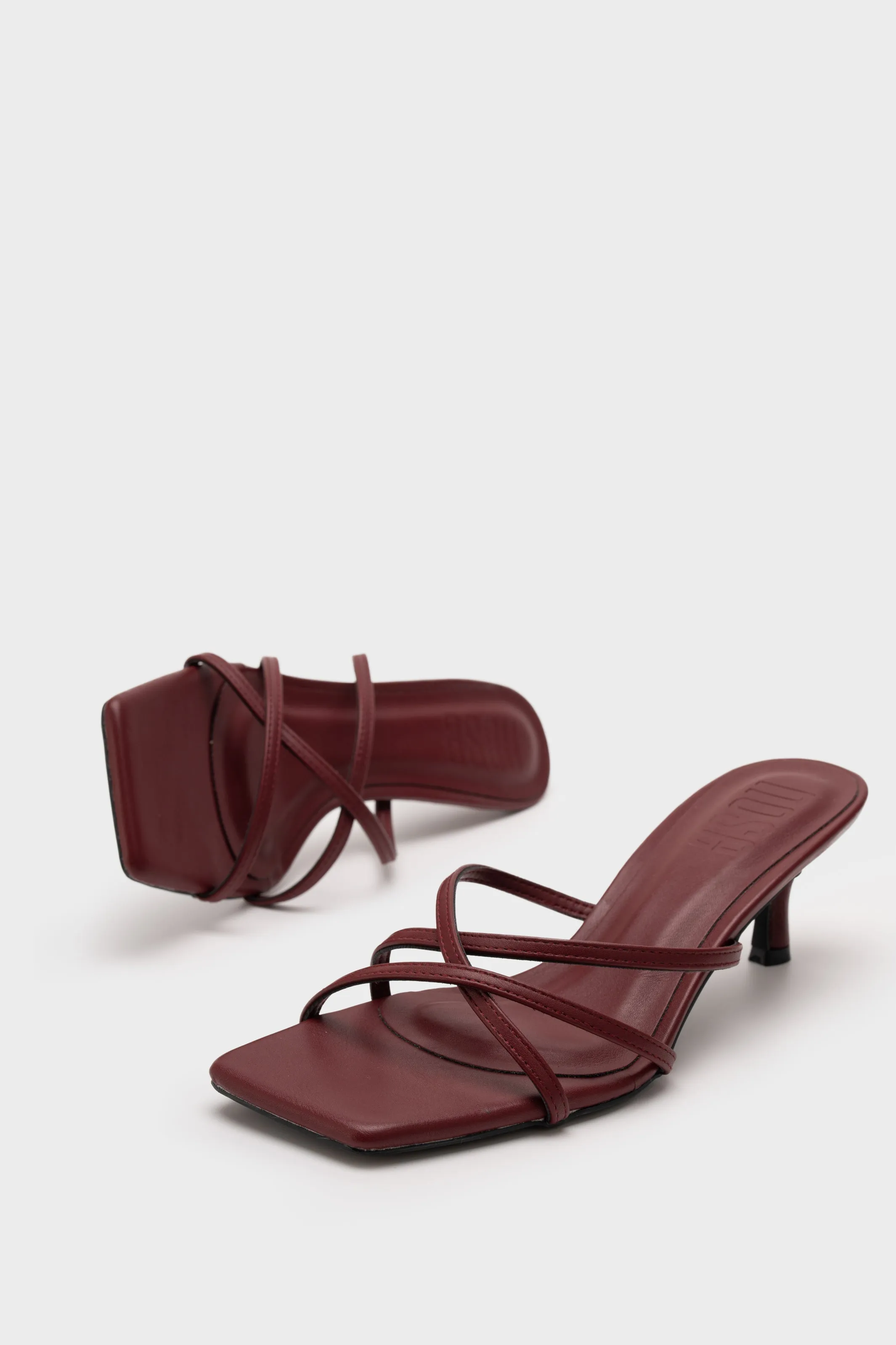 STRAPPY HEEL SLIDE